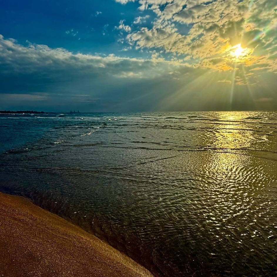 Photo by LoveIsrael.com on March 08, 2026. May be an image of cloud, beach, twilight, horizon, nature, ocean, water and text.